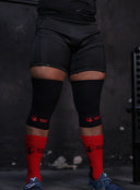 Knee Wraps vs. Knee Sleeves for Powerlifting — Which One Do You Actually Need?